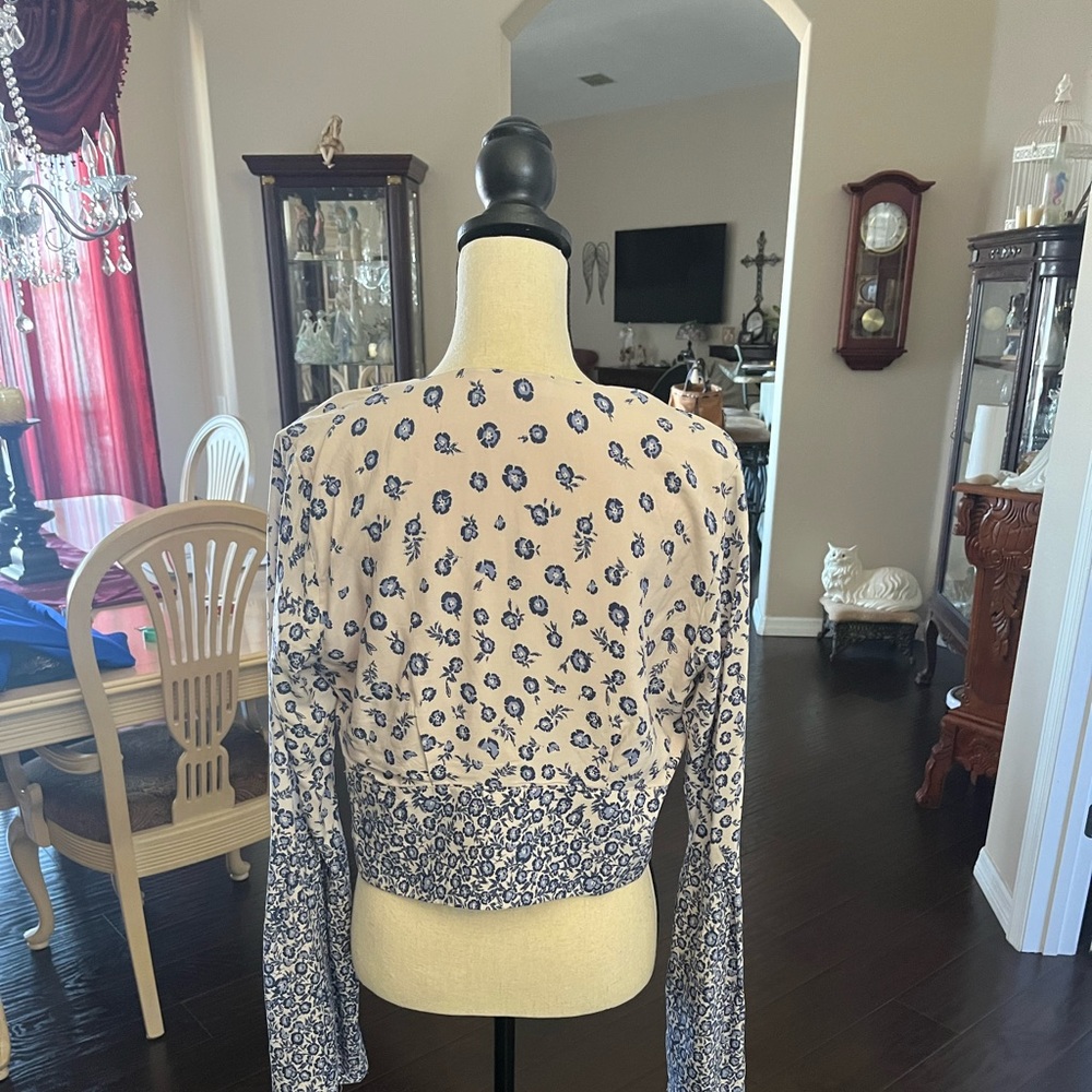 Beautiful cropped BoHo top with bell sleeves.